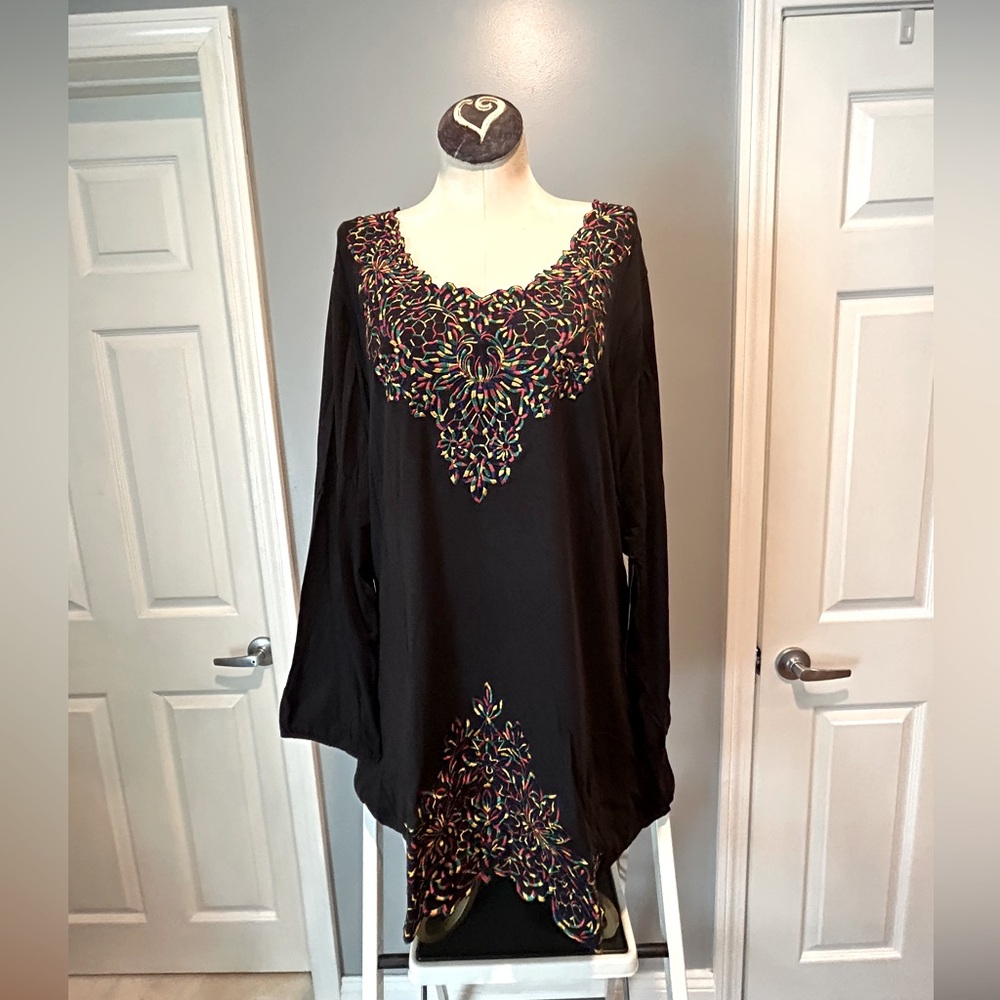 Reverse image tunic top
